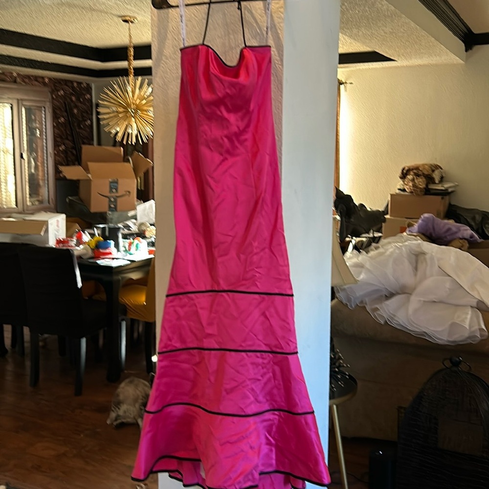 Prom dress 3/4 polyester wiith inlay. Dress needs to need to dry cleaned